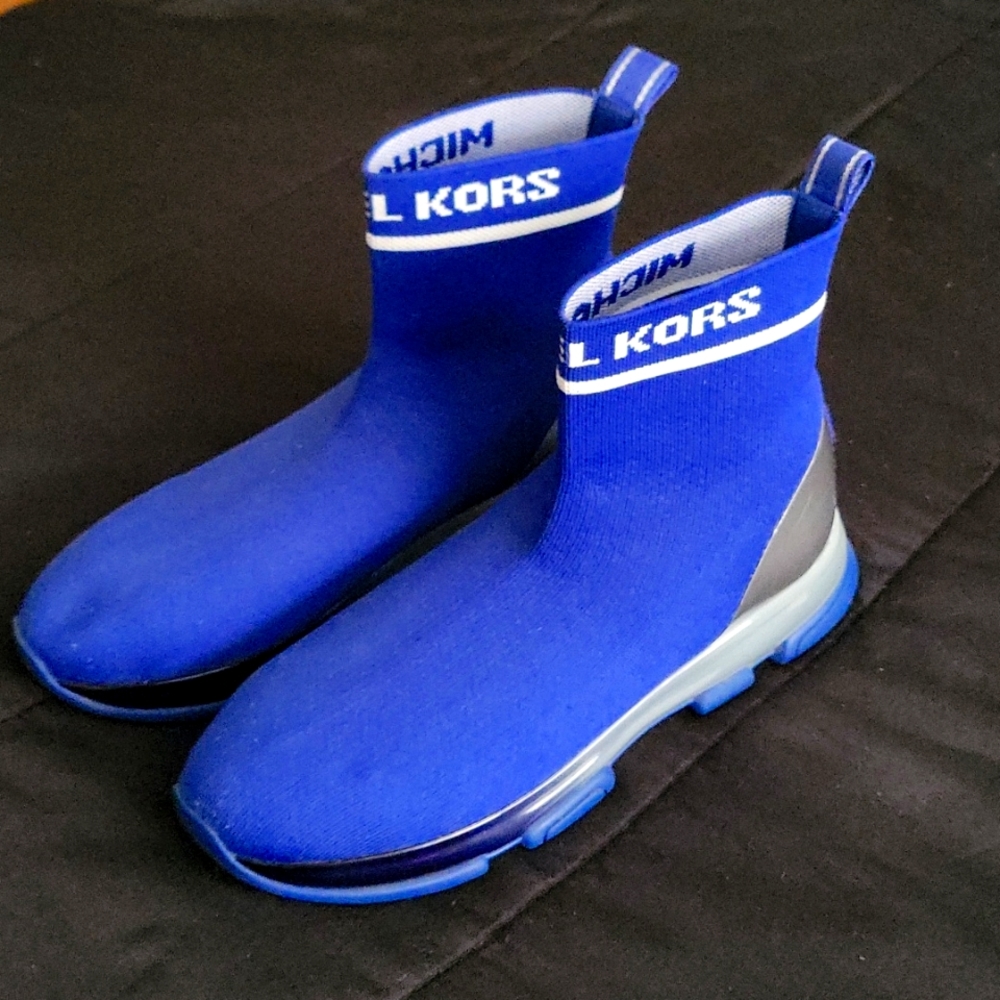 Slightly used michael kors slip on sneakers